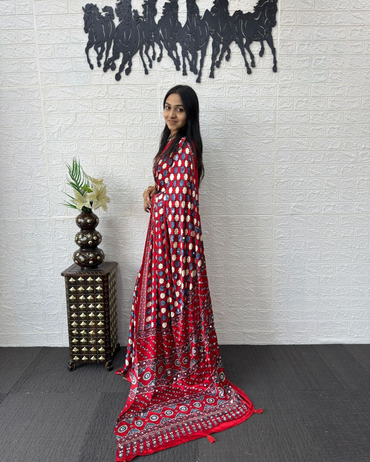 Printed Georgette Saree with Mirror Work Pallu and Border Detailing