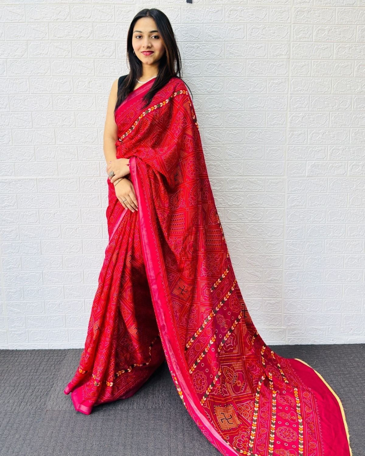 Traditional Bandhani Printed Saree with Ethnic Motif Pallu and Border Detailing