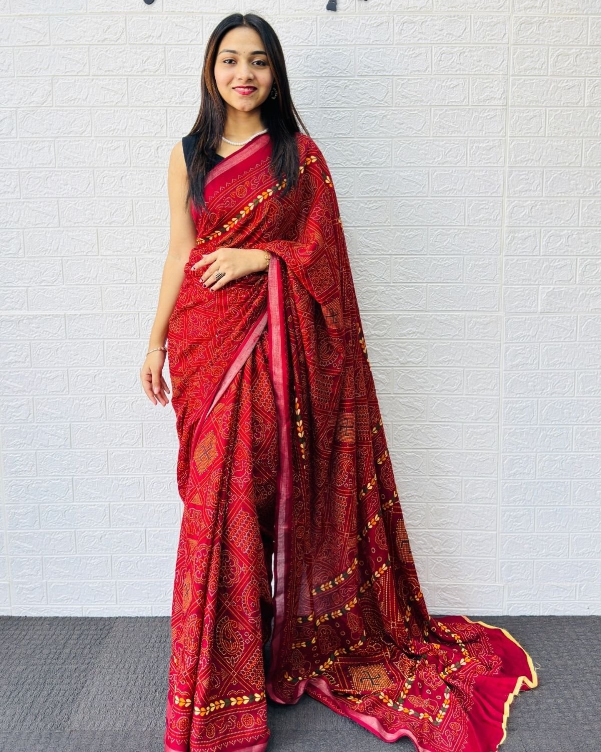 Traditional Bandhani Printed Saree with Ethnic Motif Pallu and Border Detailing